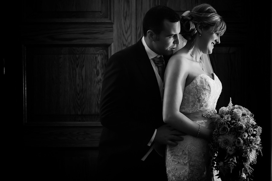 Groom holding Bride by North Wales Wedding Photographer Celynnen Photography