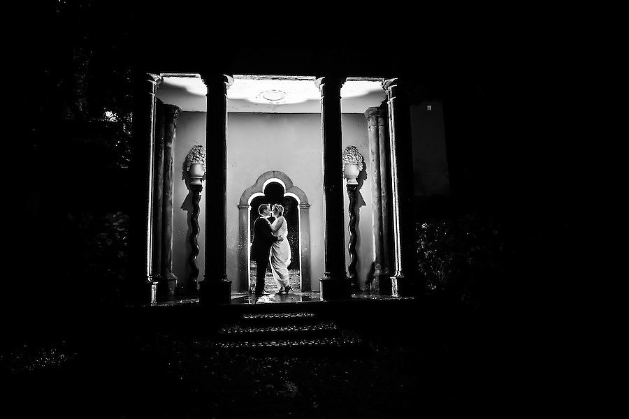 Black and white image of the bride and groom about to kiss at their wedding in Portmeirion