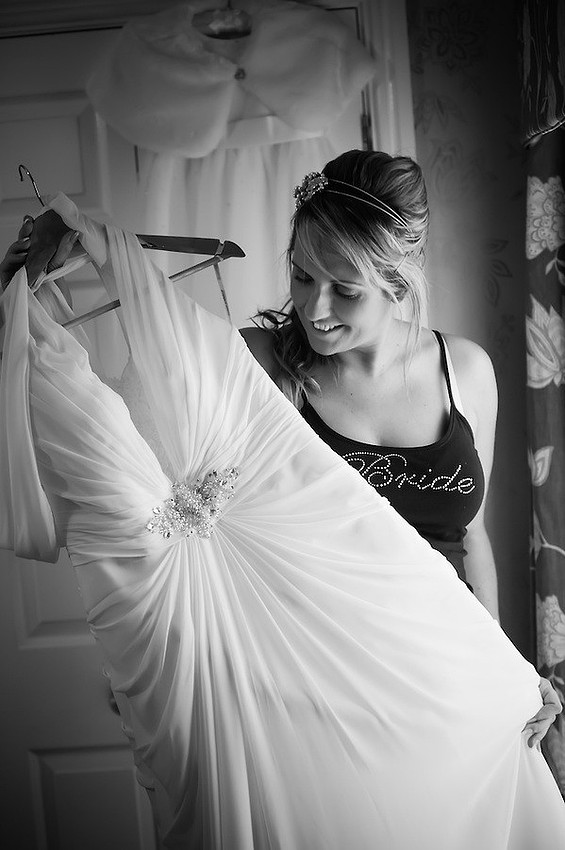 Black and white image of the bride with her wedding dress before her wedding in Portmeirion.