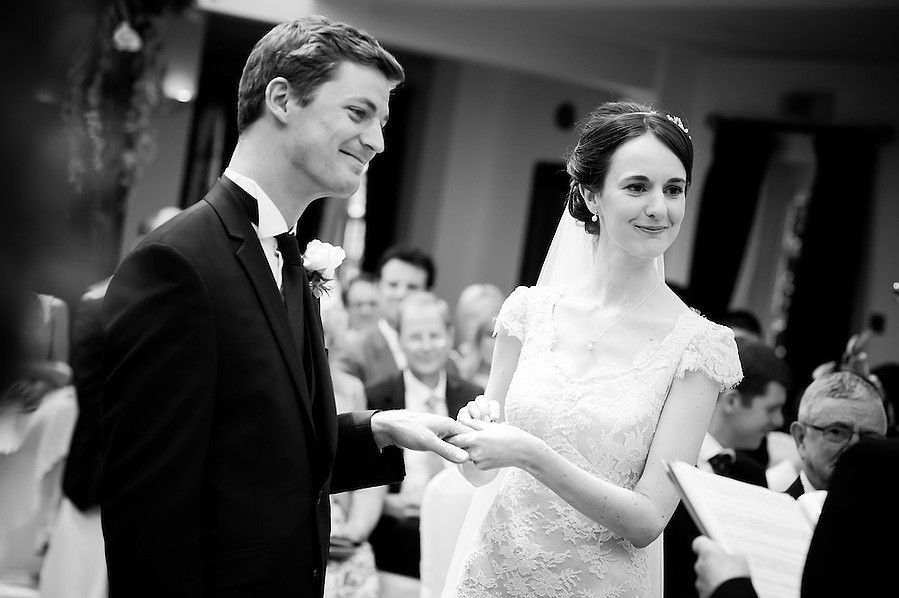 Black and white image of the bride and groom during the wedding ceremony at Plas Hafod.
