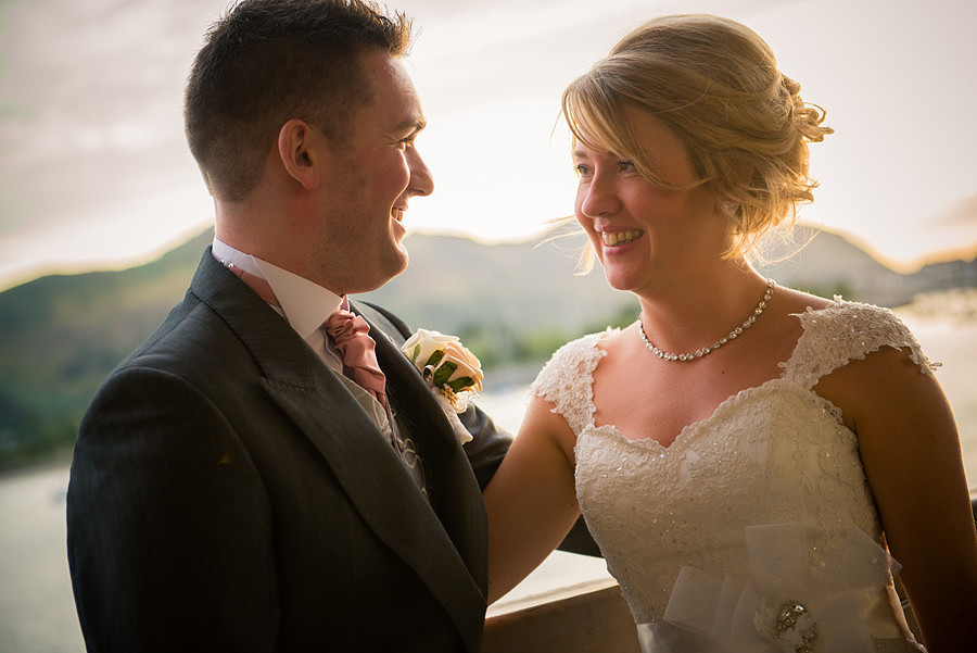 Bride and groom in the sunset at the Deganwy Quay. Wedding Photographer: Celynnen Photography