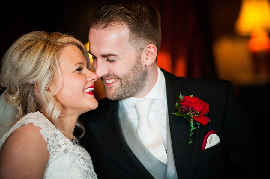 Bride and Groom Happy on Wedding Day at Ruthin Castle by photographer Celynnen Photography