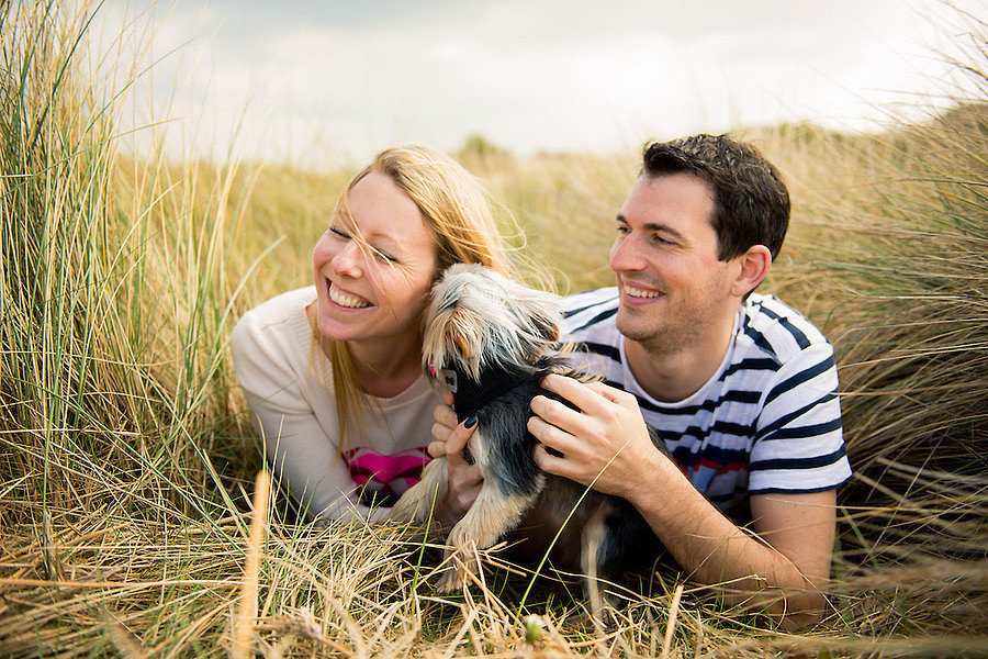  A happy couple with their dog on Talacre Beach for their pre wedding shoot.