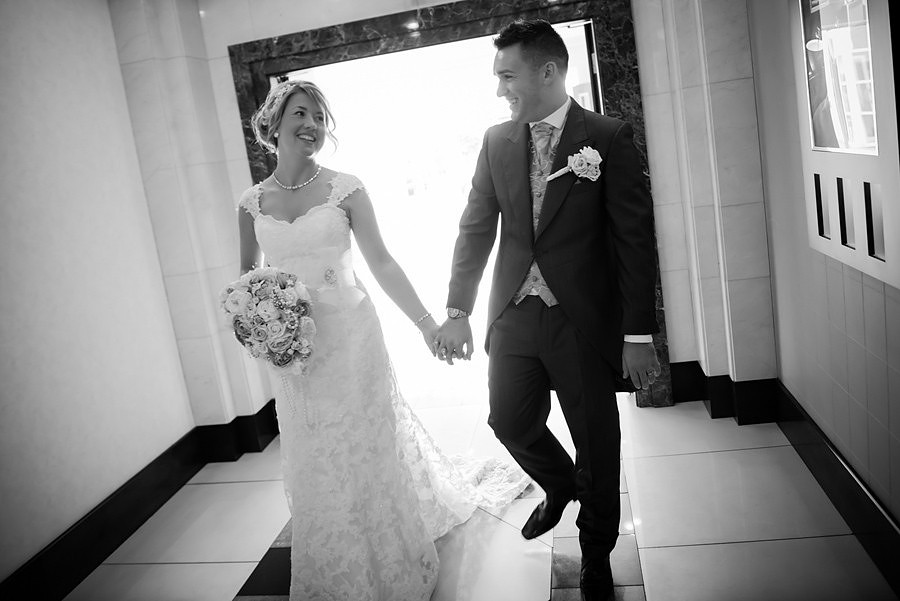 bride and groom at the Deganwy Quay. Wedding Photographer: Celynnen Photography