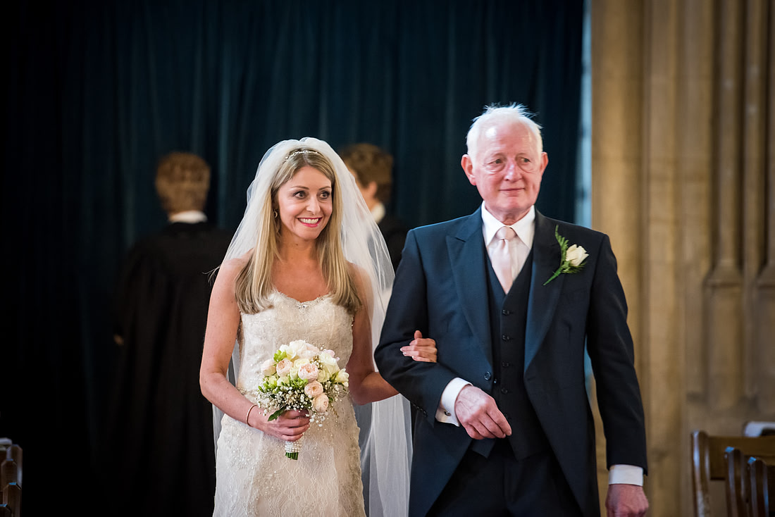 Image of the bride and her father walking down the aisle at a wedding in Buckinghamshire