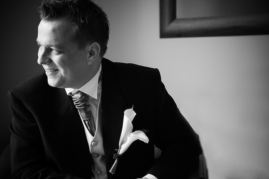 black and white image of the groom before the wedding.